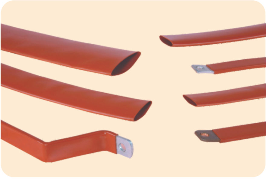 Brick-red GMB / GHB busbar sleeve: loose flattened lengths and flat busbars sleeved in the tube with drilled ends left bare