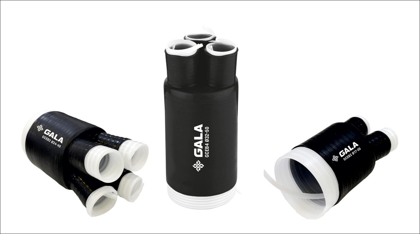 Three black GALA GCEB cold shrink breakouts with white finger cores, two-core and four-core, on white