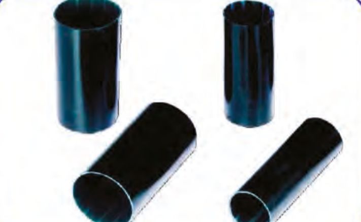 Four black INSULTUBE Commercial (GSF) tubes for fibre optic closures, two upright and two lying down