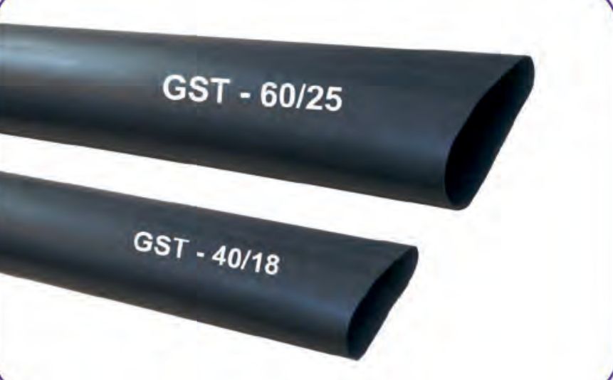 Two black GST stress control tubes, printed GST-60/25 and GST-40/18